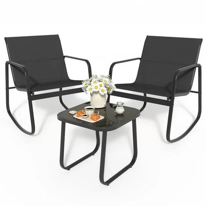 Two black chairs with a matching table on a white background
